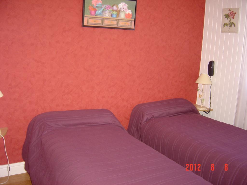 Arcantis Hotel La Residence Cergy Quarto foto